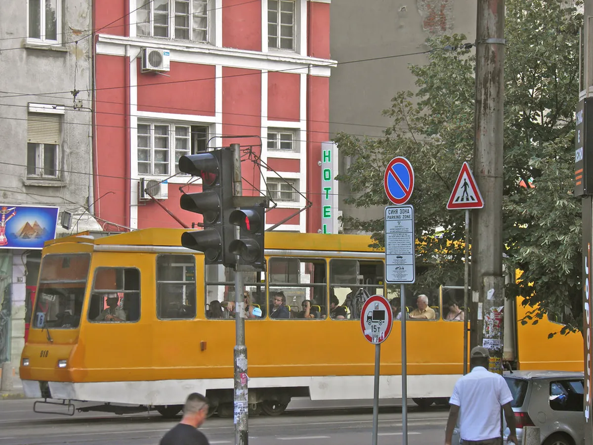 Sofia metro station platform with trains and modern signage in Bulgarian and Latin alphabets