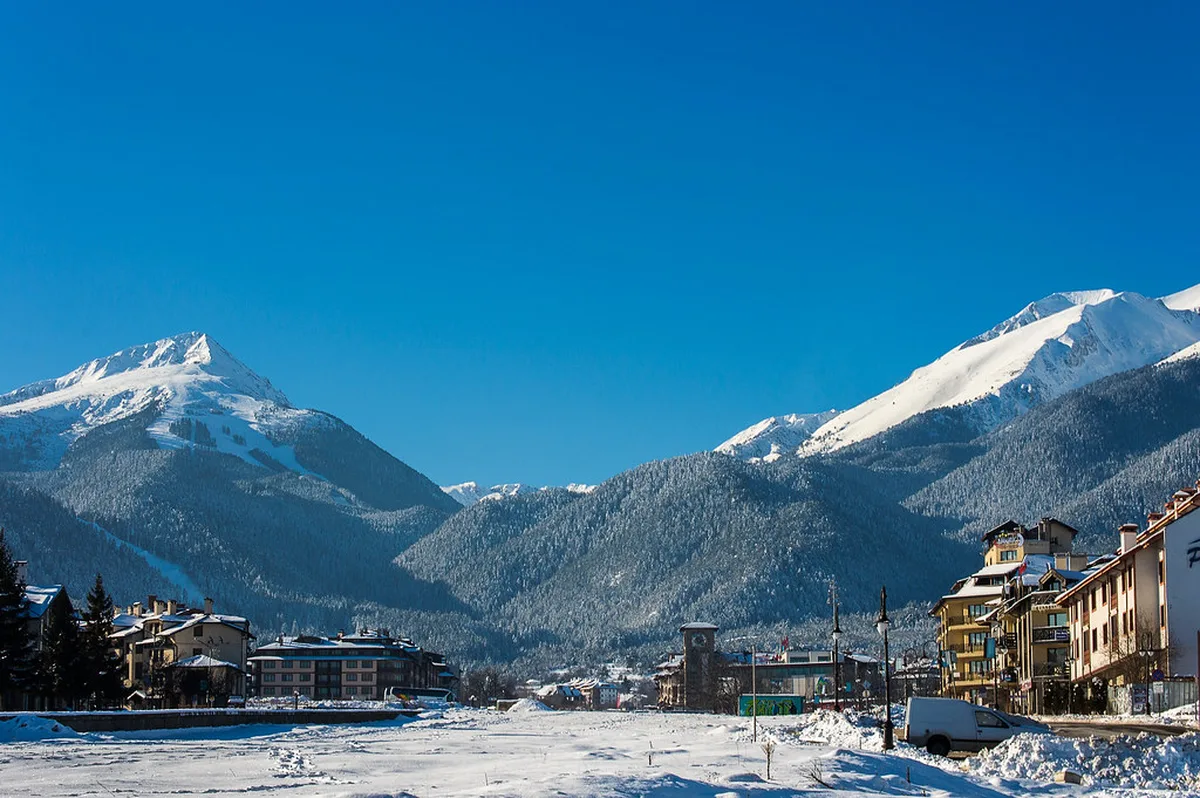 Skiers and the gondola at Bansko ski resort during the busy February high season
