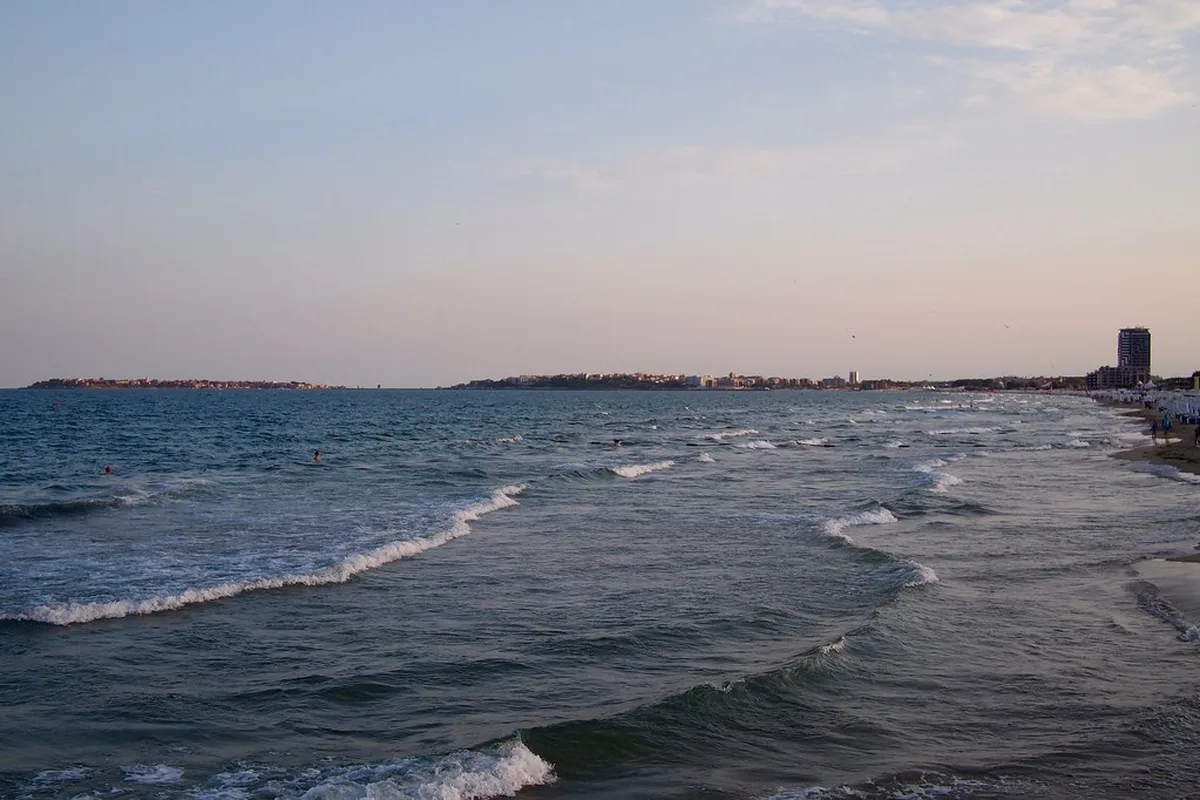 Golden sandy beach and turquoise water on the Black Sea coast at Sunny Beach, Bulgaria in summer