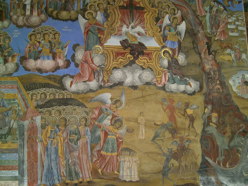 Frescoed arcades wrapping the courtyard