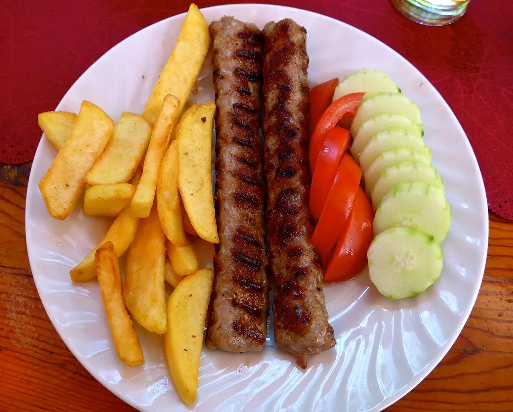 Kebapche and kyufte grilled on the skara