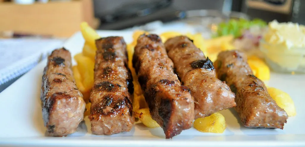 Kebapche and kyufte grilled on the skara
