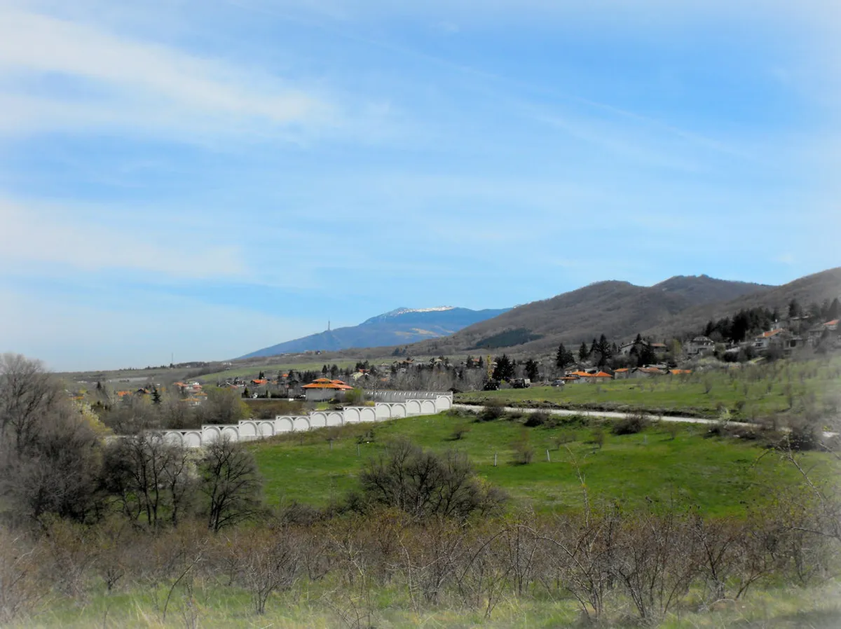 Koprivshtitsa town and hillside meadows in summer, Bulgaria