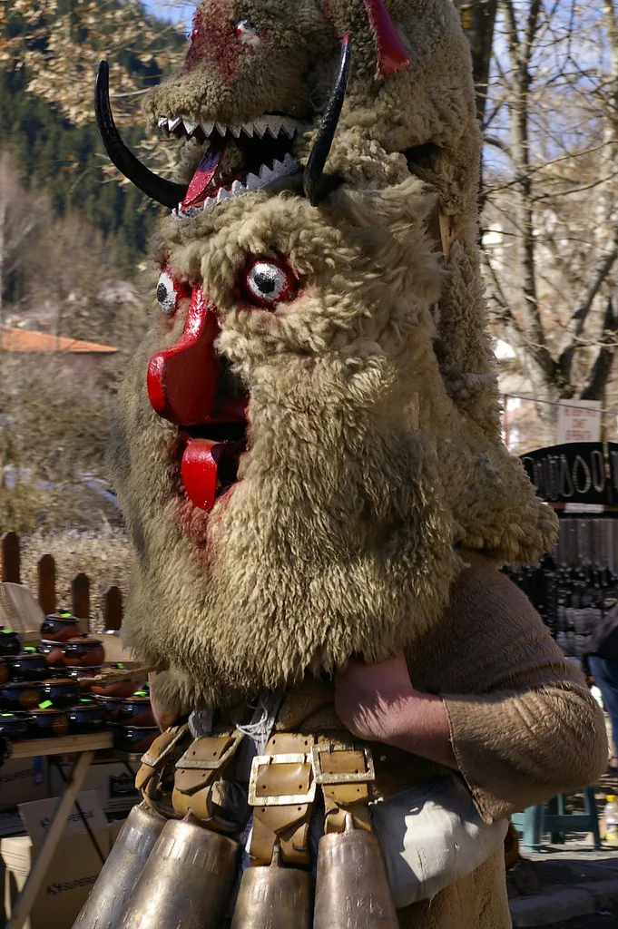 Bulgarian kukeri dancers in shaggy costumes with heavy bells
