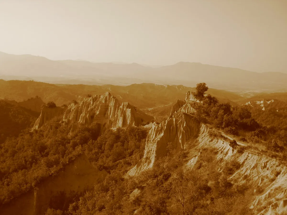 The distinctive sandstone Melnik Pyramids rising from the valley between Melnik and Rozhen Monastery in Bulgaria